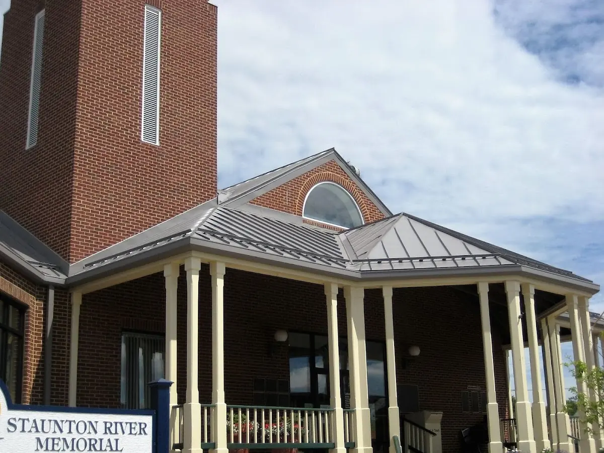 Skilled roofing craftsmen working on a residential roof in Rockwood